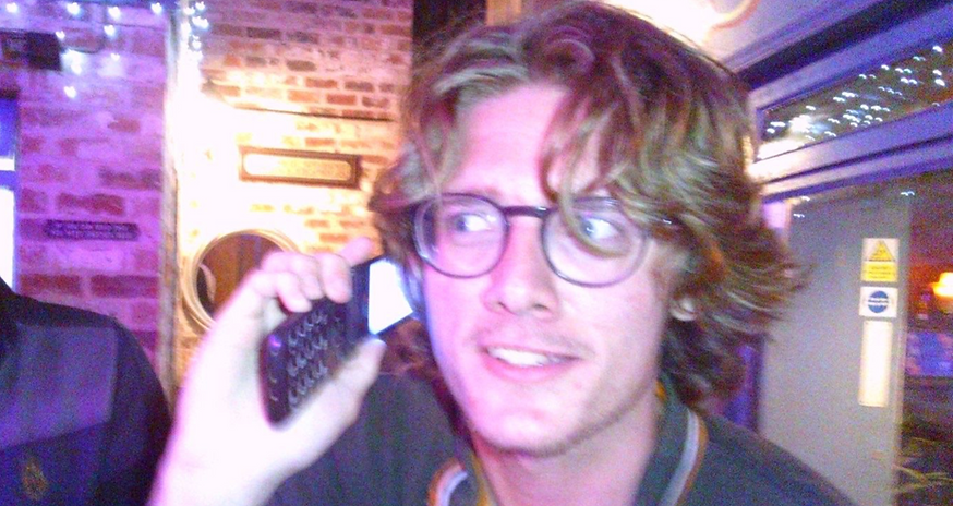 A photo of Raschal on his flipphone