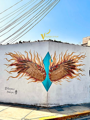 Graffiti of wings on fire in barranco neighborhood in peru