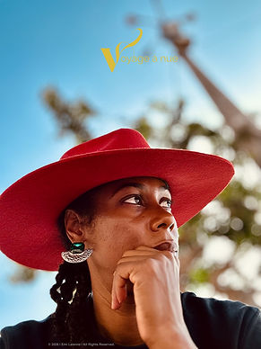 Closeup of Black woman with red alpaca hat in lima peru