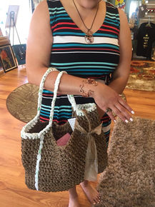 Kathalina with her handmade bag and copper jewelry