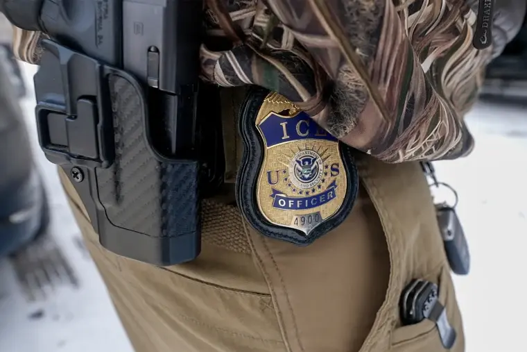 An ICE agent's badge in St. Paul, Minn., in December. Bill Angelucci / NBC News