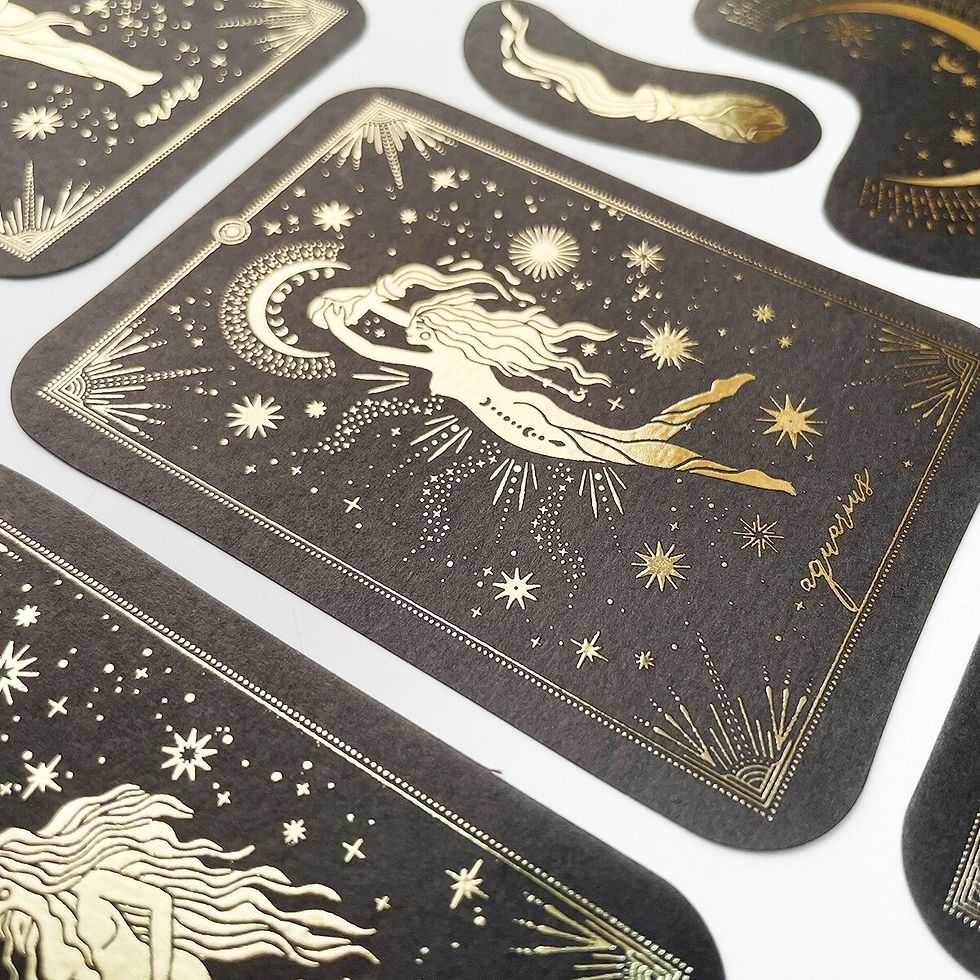 Thumbnail: Tarot cards featuring gold foil constellations.