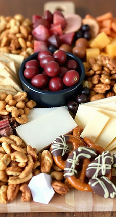 personal sized charcuterie board meat, cheese, olives.jpg
