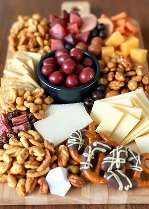personal sized charcuterie board meat, cheese, olives.jpg
