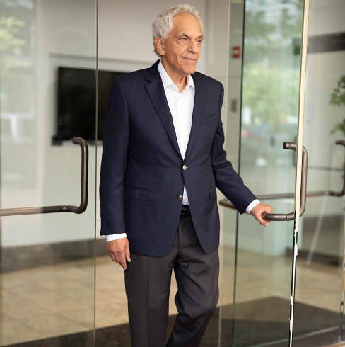 Robert in a business suit entering Ontario family court, representing courtroom integrity.