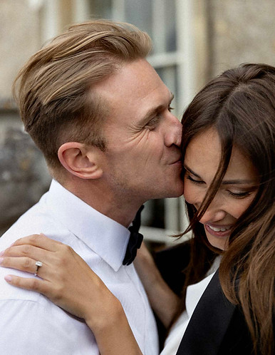 bride-groom-kissing-smiling-wedding-day.jpg