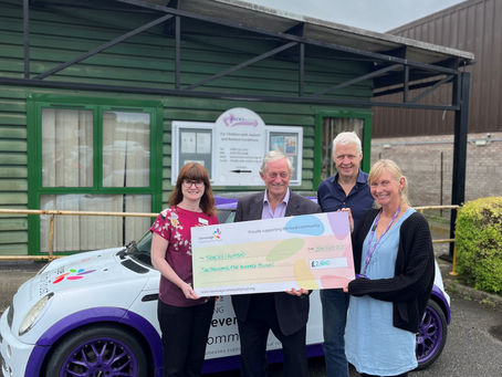Stevenage Community Trust make donation to TRACKS Autism playground.