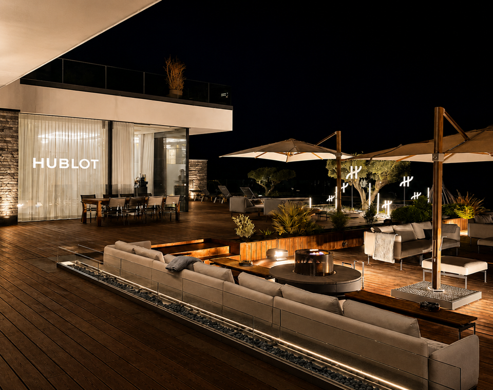 Hublot branded luxury outdoor terrace at night with seating