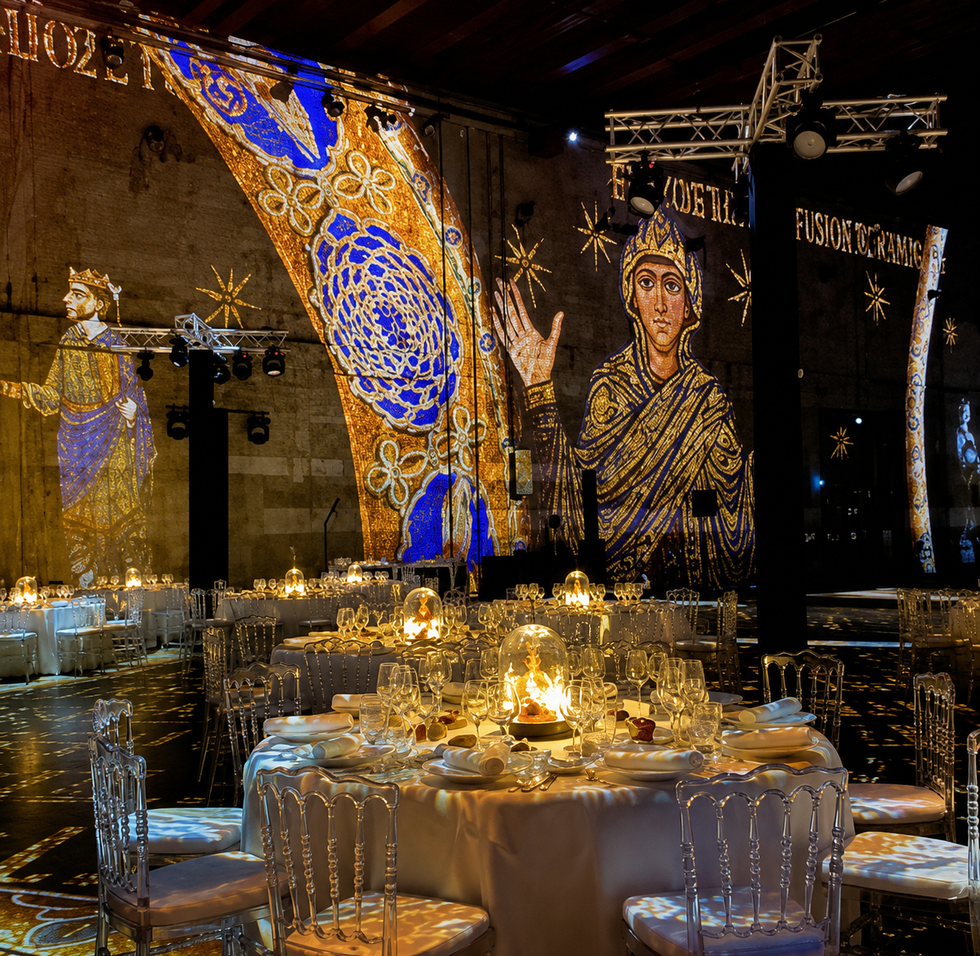 LOUIS XIII dinner with regal projections on stone walls
