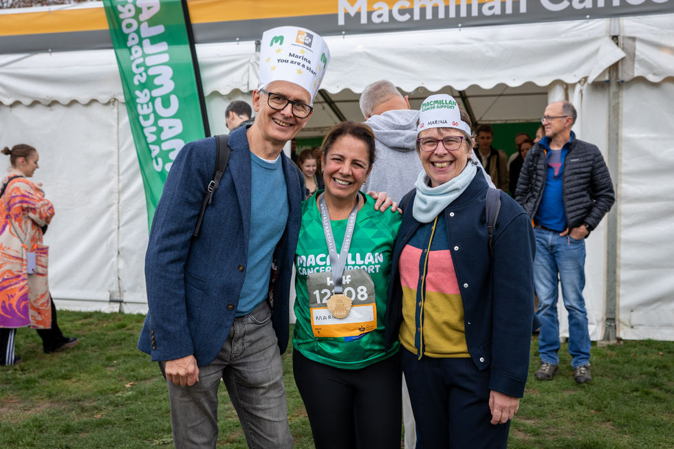 Supporters and runners representing Macmillan Cancer Support at the Royal Parks Half Marathon, London, October 2025, photographed by event photographer Harvey Aspell
