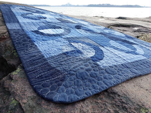 Facing a quilt with rounded corners