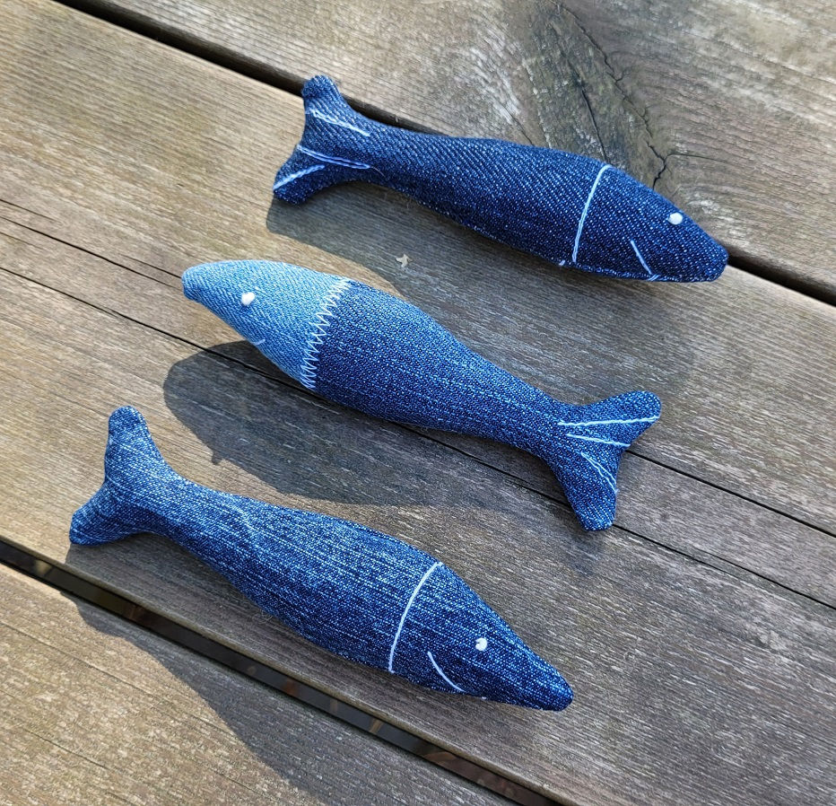 Thumbnail: Flat lay of three fish-shaped  cat toys with catnip