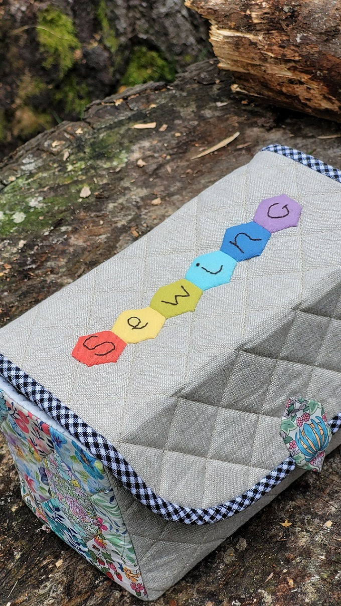 Thumbnail: Close-up of patchwork embellishment on the lid of handmade sewing box.