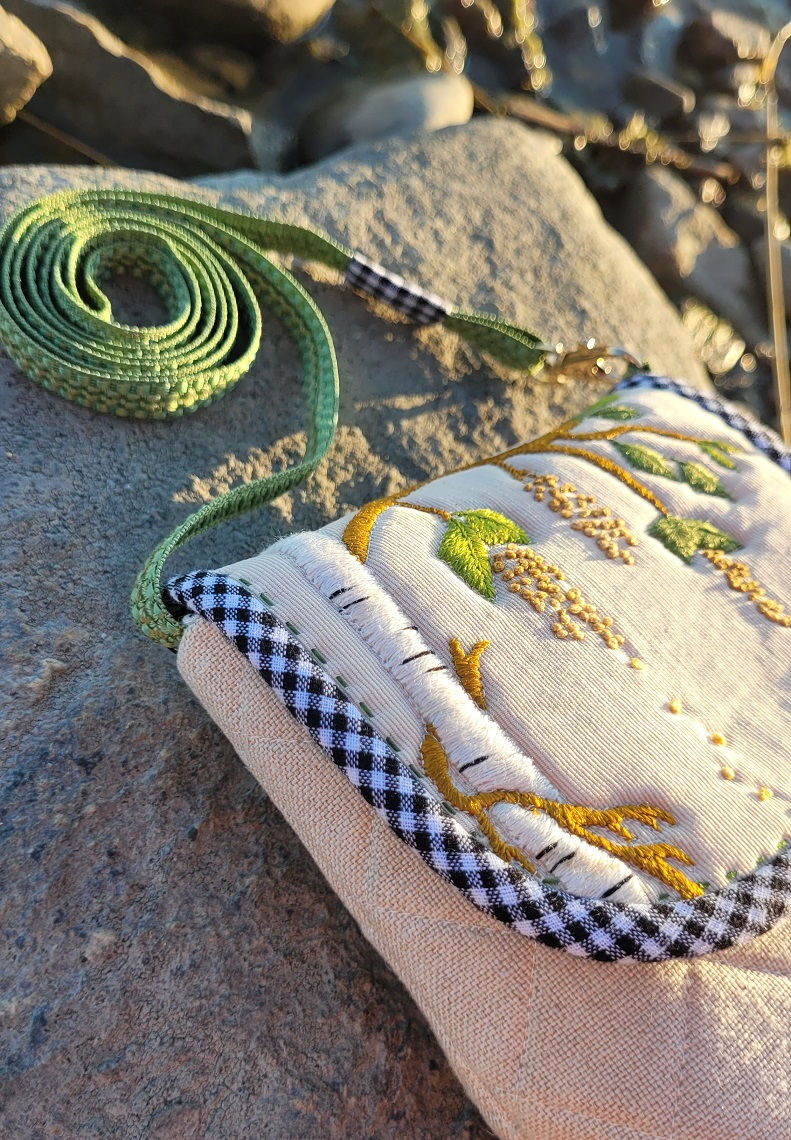 Thumbnail: Angled view of quilting on the flap of finished Summer essentials bag.
