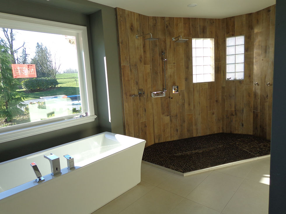 Another Atlanta Flooring Centre bathroom! Contemporary bathroom design featuring a classic touch with wood-textured shower walls and a modern bathtub, complemented by a scenic window view.