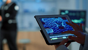 close-up-scientist-analysing-health-informations-tablet-while-specialist-sport-supervises-