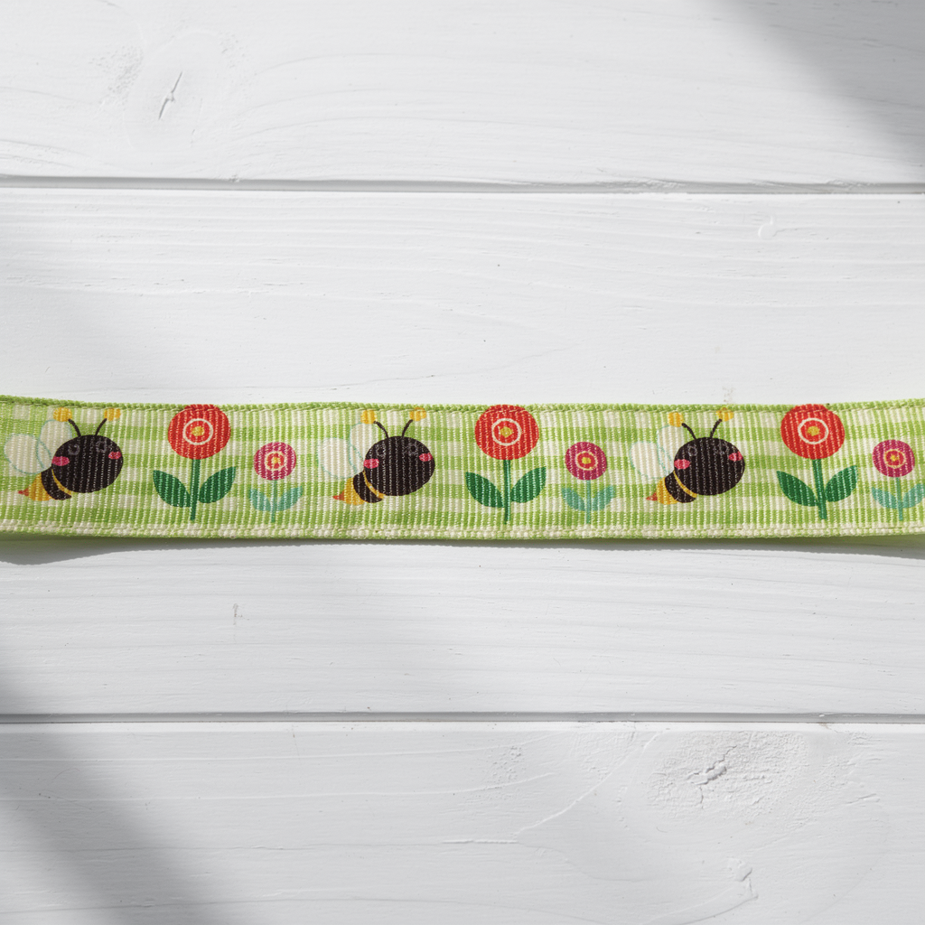 1mètre de ruban en polyester  de 2,5 cm de largeur