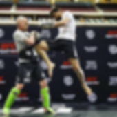 Coach Alex Sitpangpondam Xaver and Carlos Condit