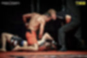 Coach Andrew Tenneson fighting
