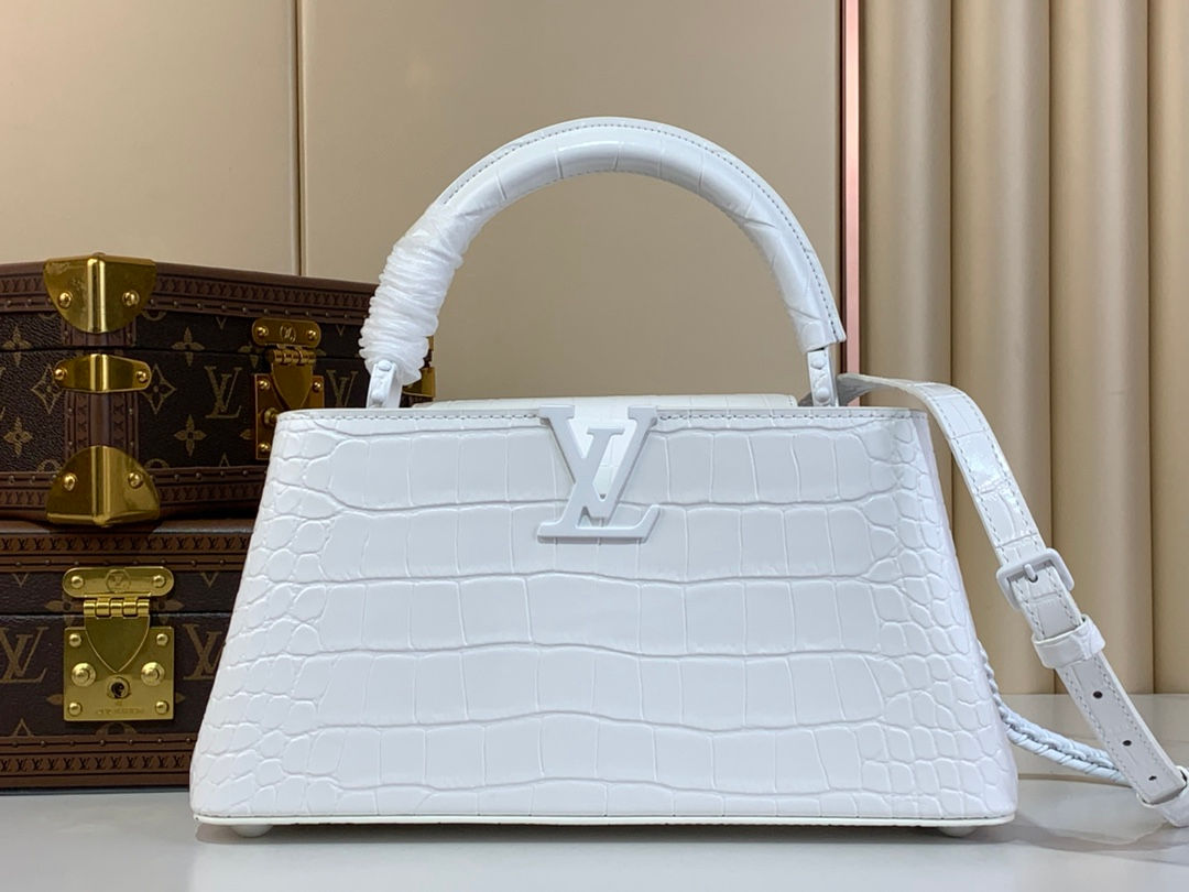 Luxe Vault NYC White Louis Vuitton Crocodile Leather Handbag with LV Logo.