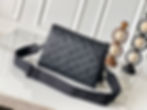 Lux Studio USA Louis Vuitton Bag – Black embossed leather crossbody with monogram detailing.
