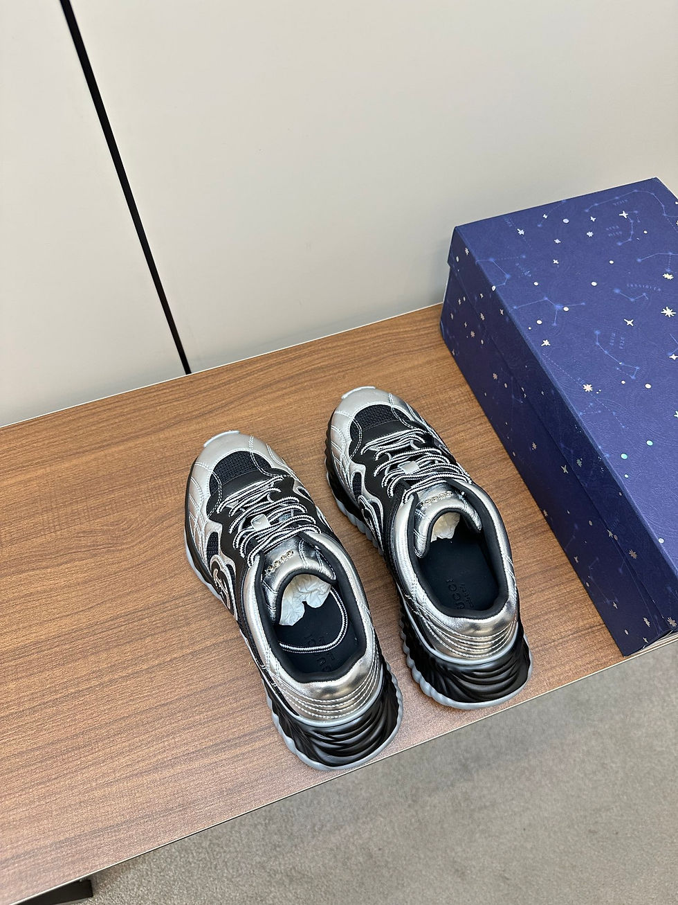 Luxe Vault NYC Gucci Metallic Silver Sneakers with Black Accents.