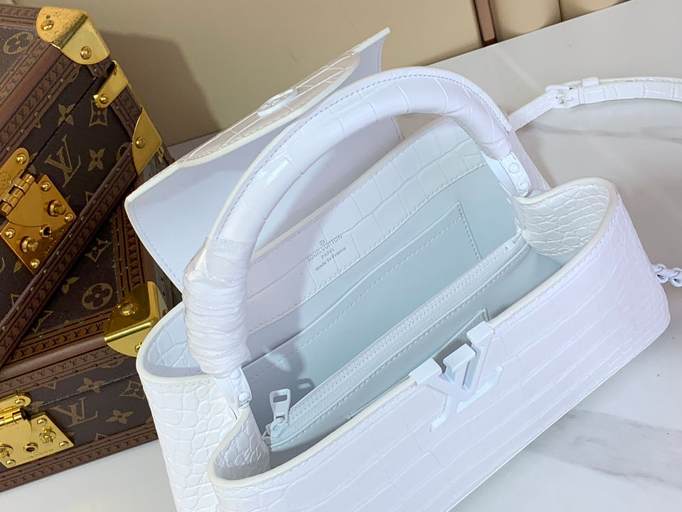 Luxe Vault NYC White Louis Vuitton Handbag Interior with Elegant Leather Finish.