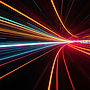 lots of neon colored lines flying across time lapse_edited.jpg