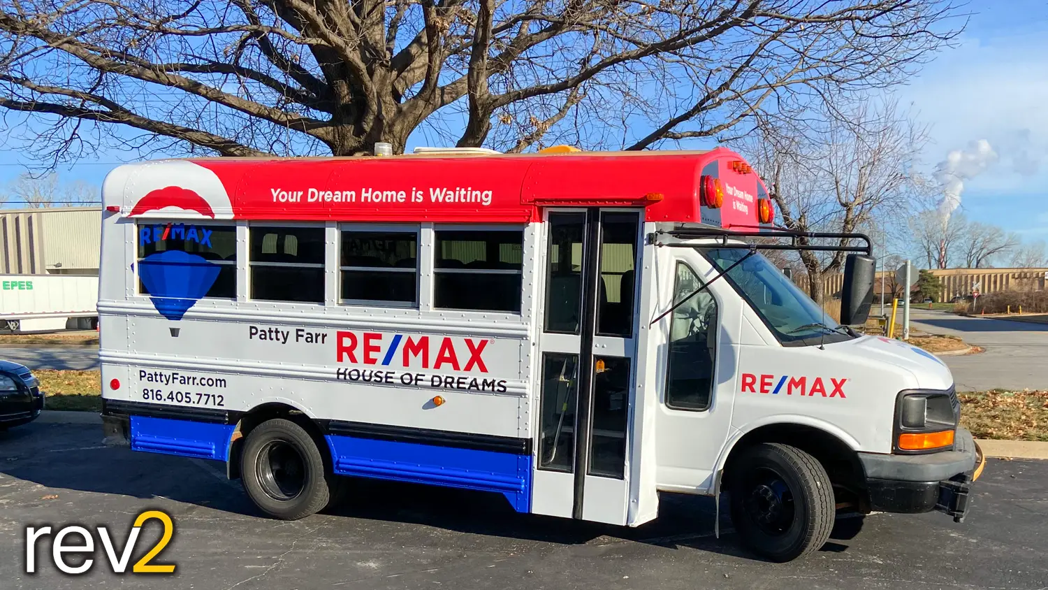 Bus Graphic Wrap in Kansas City- REV2 Design (REMAX: House of Dreams)