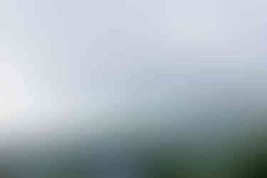 a waterfall in the middle of a body of water