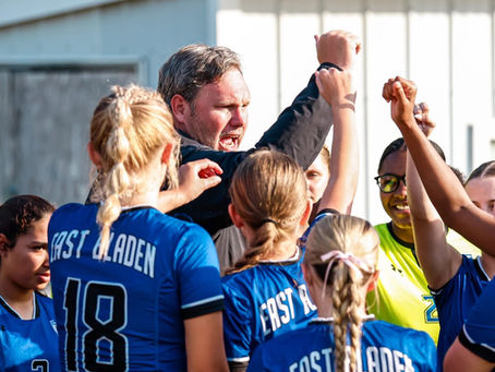 East Bladen Soccer huddle. Photo Credit: Savanna Elkins Photography.