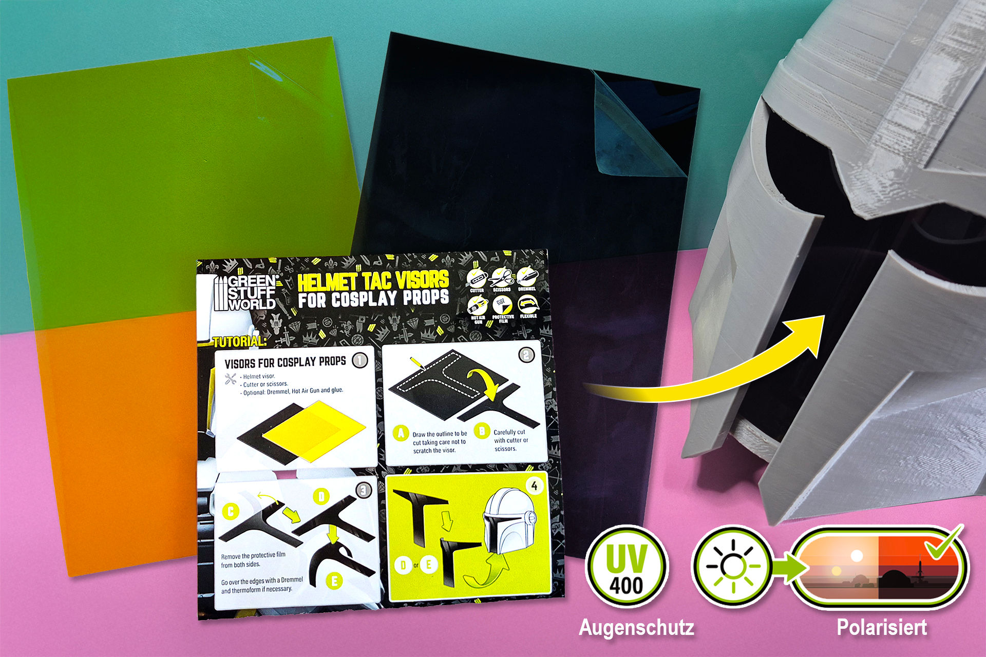 eine gelbe und eine schwarze Folie, daneben ein Mandalorianischer Helm mit einem schwarzen Visier