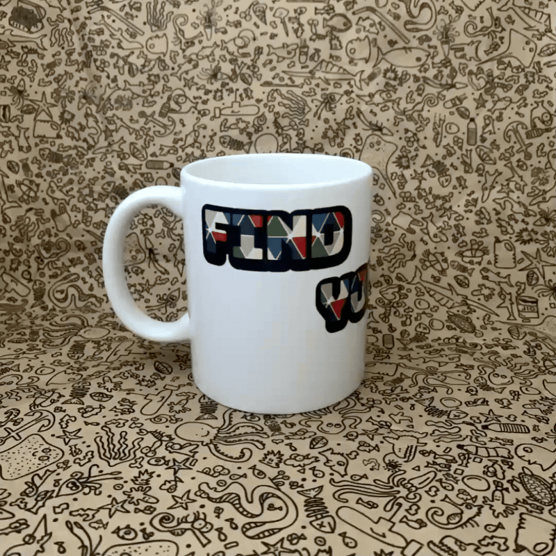 Find Your Tribe design on spinning mug