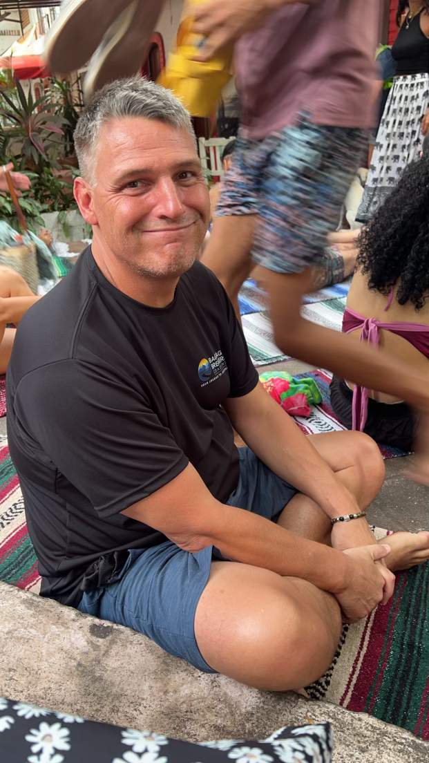 Jay Rol sitting cross legged