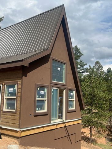 Completed A-frame cabin in the Colorado mountains