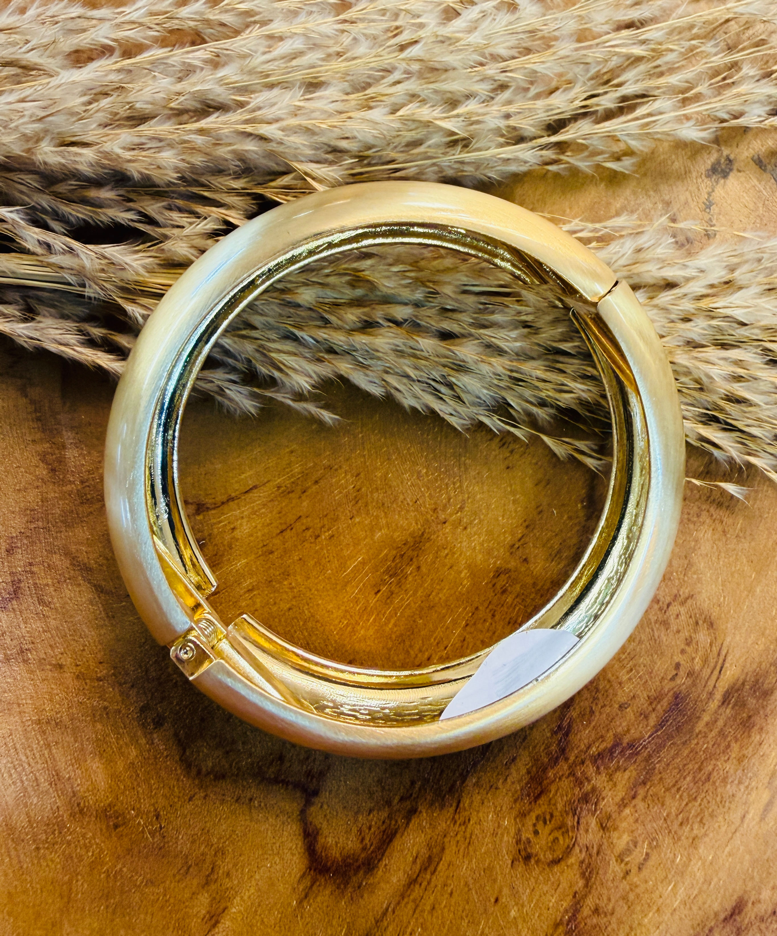 Hattie Hinged Bangle Bracele Worn Gold
