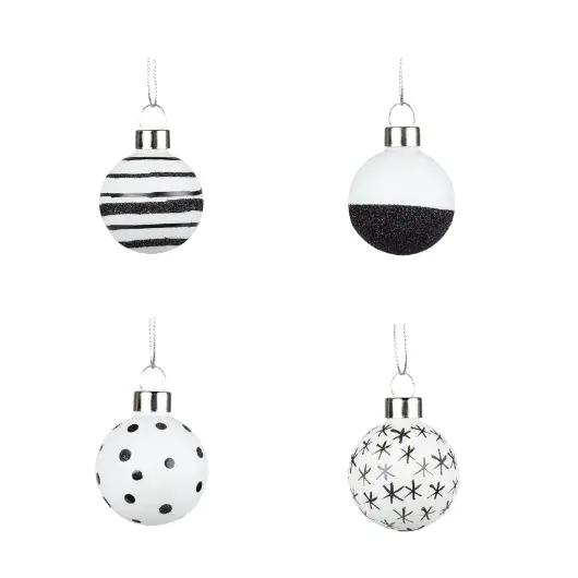 Set of four Räder black and white Christmas baubles with assorted printed patterns and glitter details