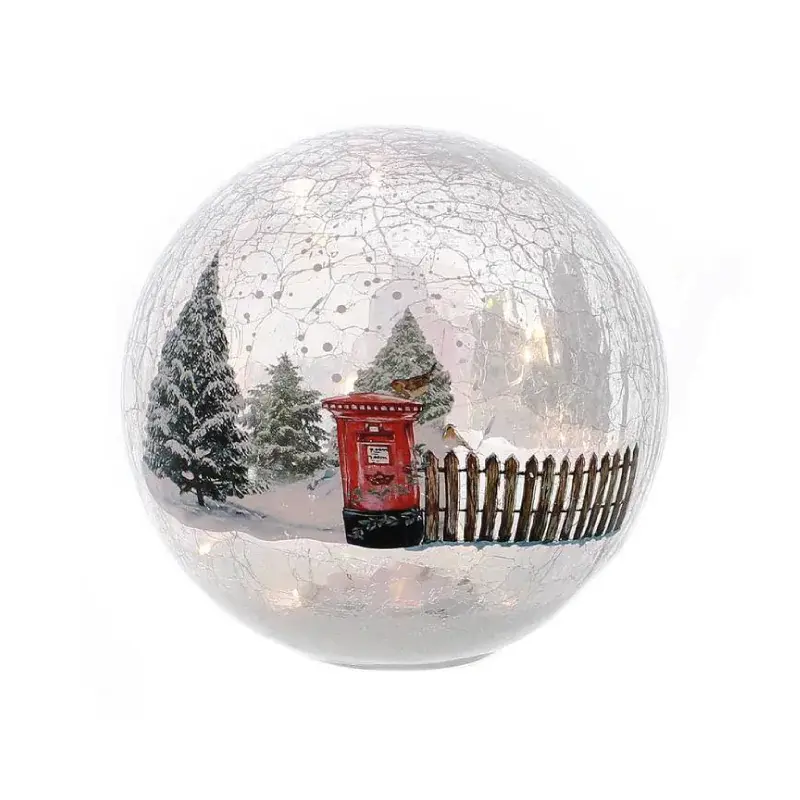 Festive 20cm light-up crackle glass ball with a red postbox, snowy trees and picket fence