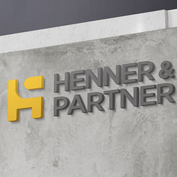 HennerPartner-logo_wall-mockup.jpg