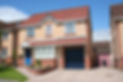 Images of a detached house with garage.