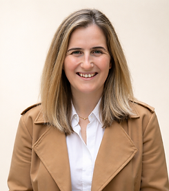 Warm professional portrait of a woman.png