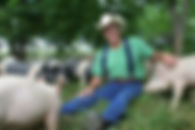 Joel Salatin with pigs.jpeg