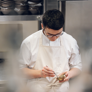 Chef Joel preparing a vegetarian Fine Dining dish