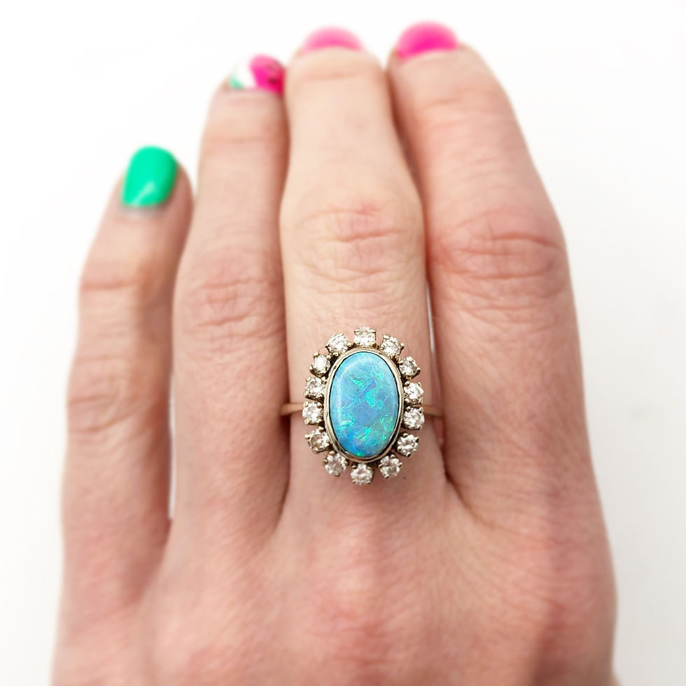 Thumbnail: Black Opal Ring With Diamond Halo