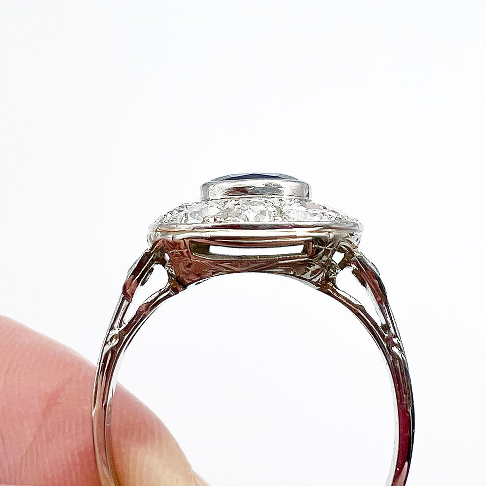Thumbnail: Art Deco Sapphire Ring With Diamond Halo