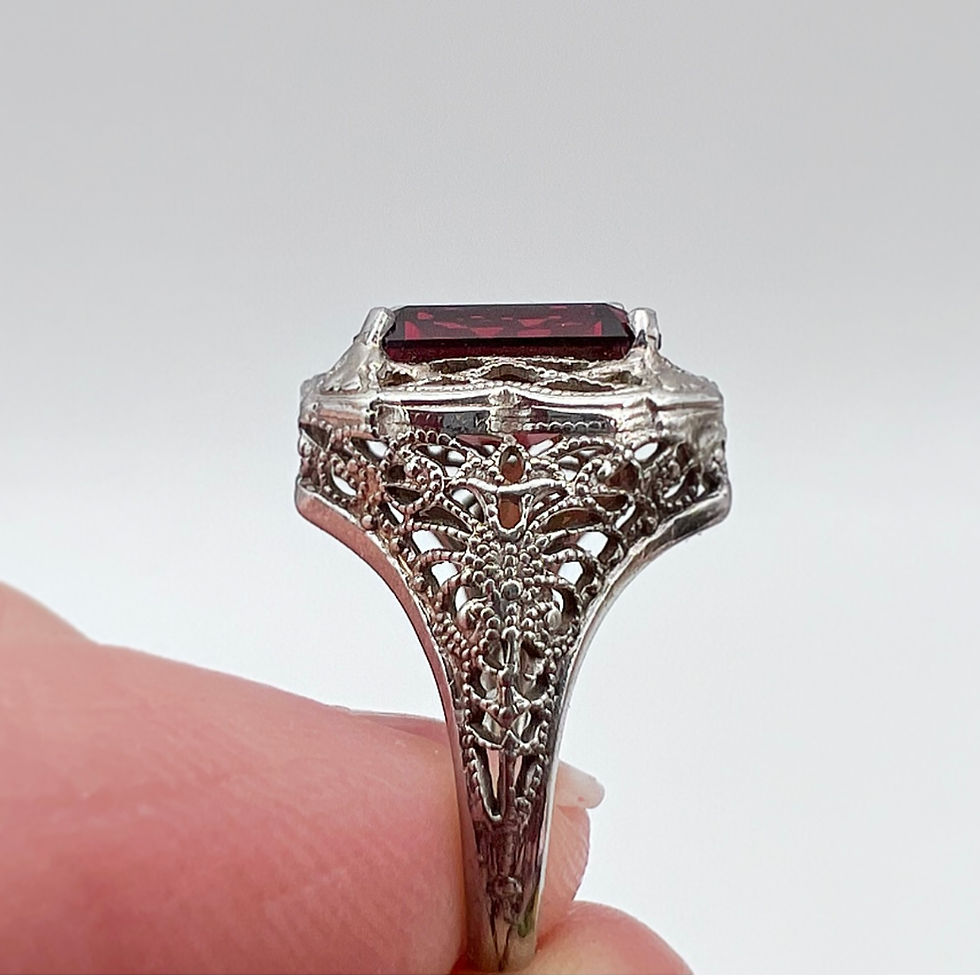Thumbnail: Early 1900's White Gold Garnet Ring