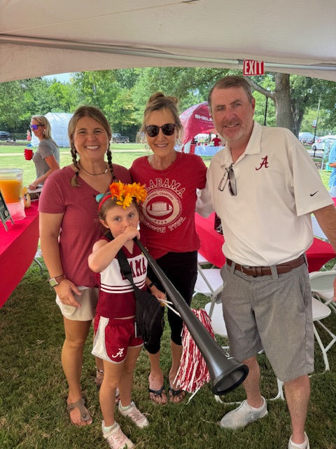 Future Bama cheerleader and a big horn!