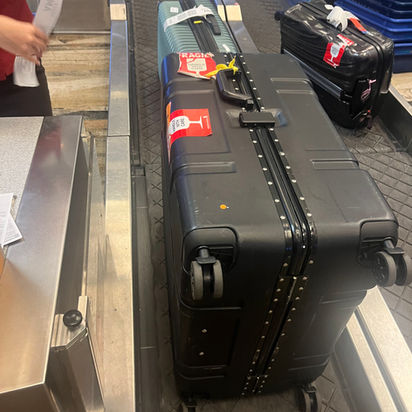 Brompton travel case on an airport luggage conveyor belt