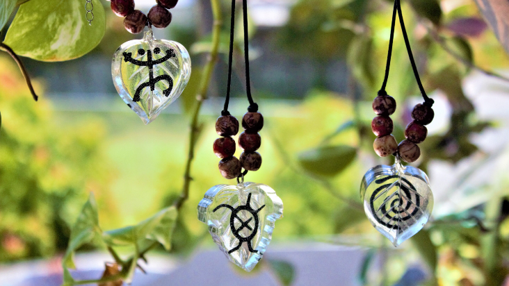 Thumbnail: Taino Art Resin Leaves Necklaces/Pendant with Taino Symbols Coqui Water Carey