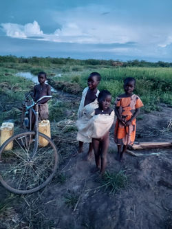 Children Fetching Water At Lake Kyoga